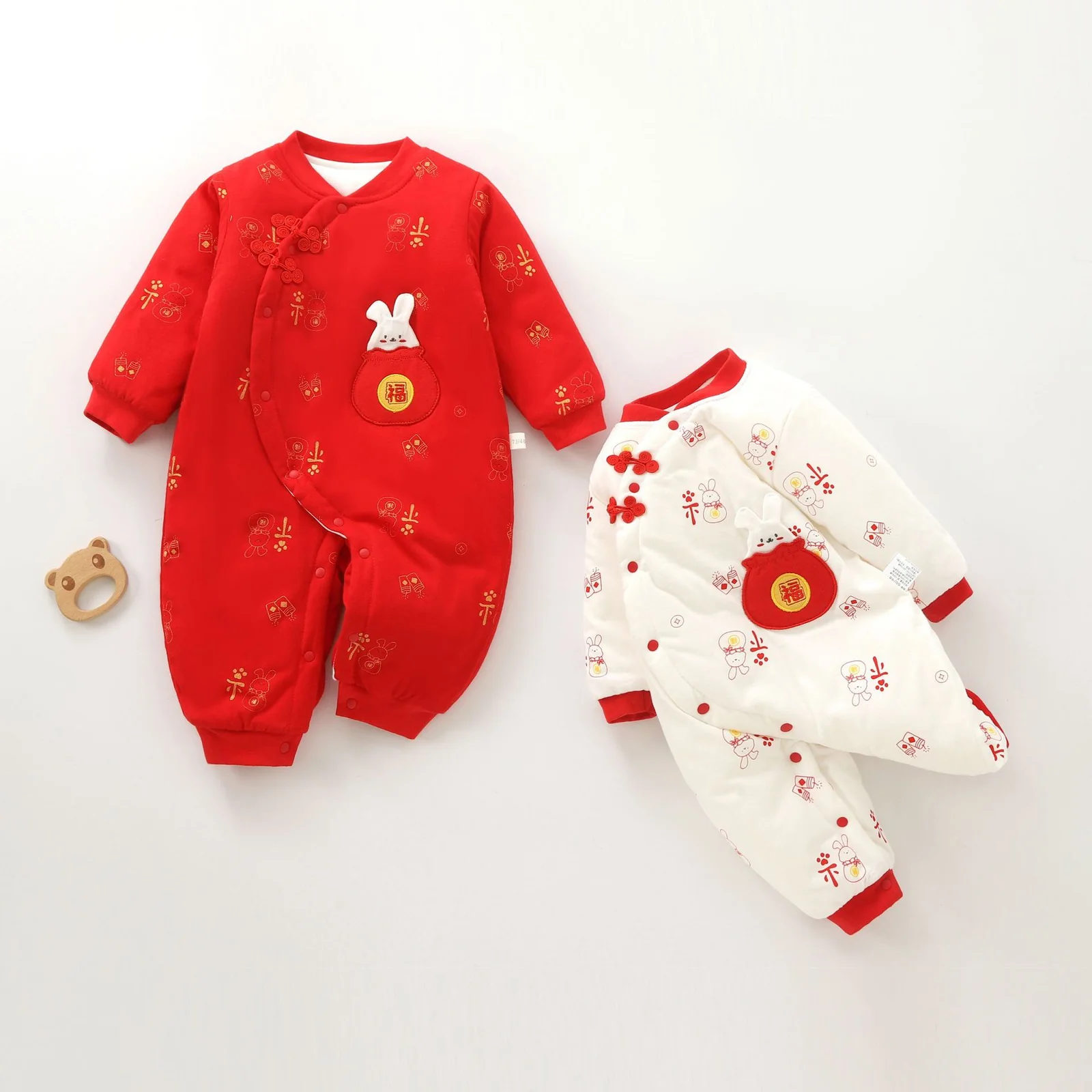 The girl's crawling suit is padded with cotton
