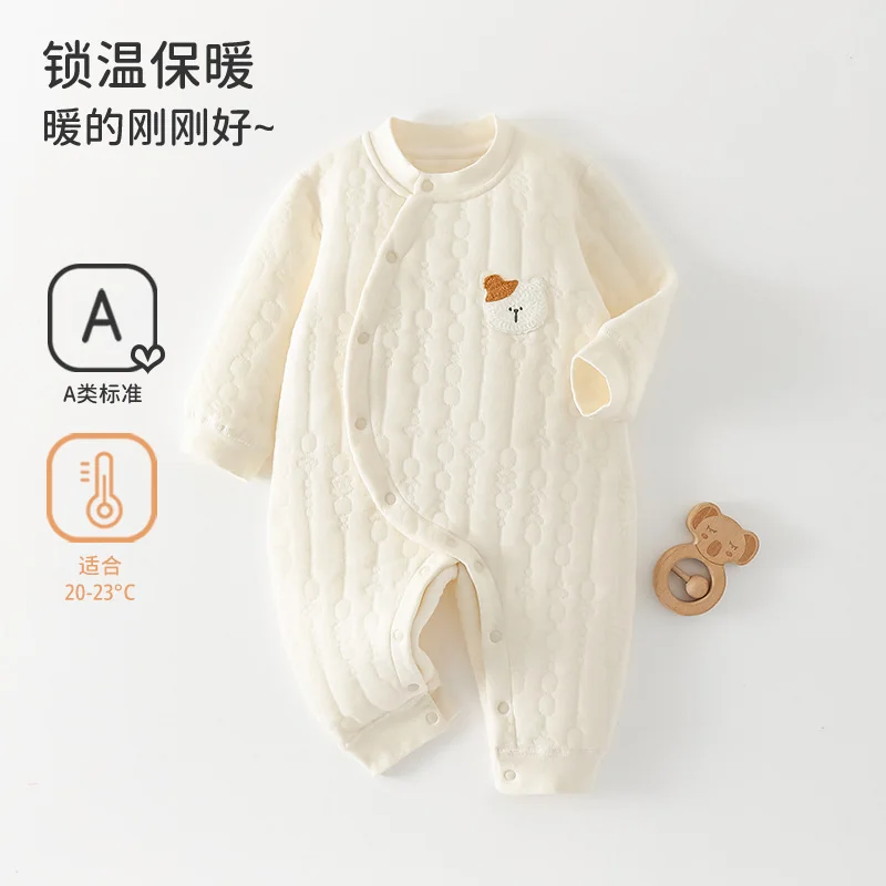 A girl's autumn and winter clothes are padded with cotton