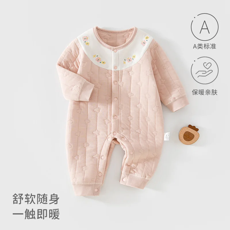 A girl's autumn and winter clothes are padded with cotton